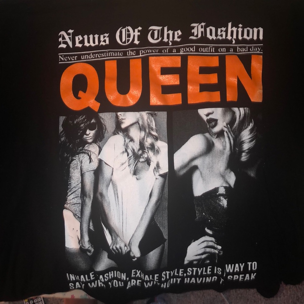 black & orange graphic shirt